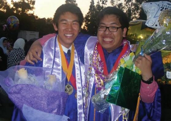 SMILING WITH SASHES - Alumni Michael Cheng and Andy Leung (from left to right) stand with their sashes and cords after the 2012 graduation ceremony.