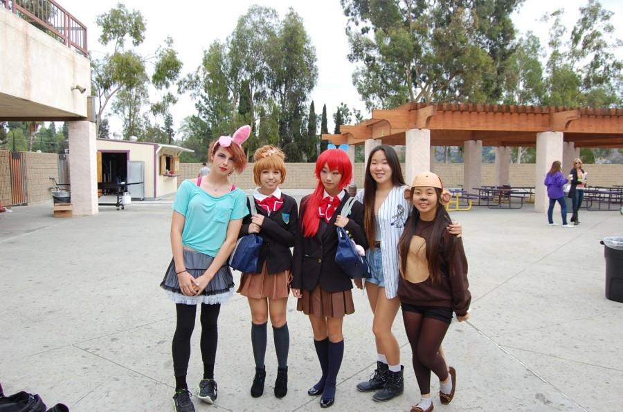 Juniors (left to right) Lucas Araya, Danielle Narciso, Nicole Li, Lauren Park, and Rachel Hwang show their costumes for All Hallows Eve. 