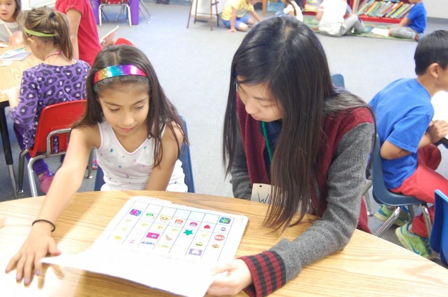 Club member Winnie Ho gives back to the community by tutoring students at Castle Rock Elementary School and being a positive role model.