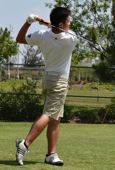 Senior Alex Lee practices his swing in an upcoming CIF match.