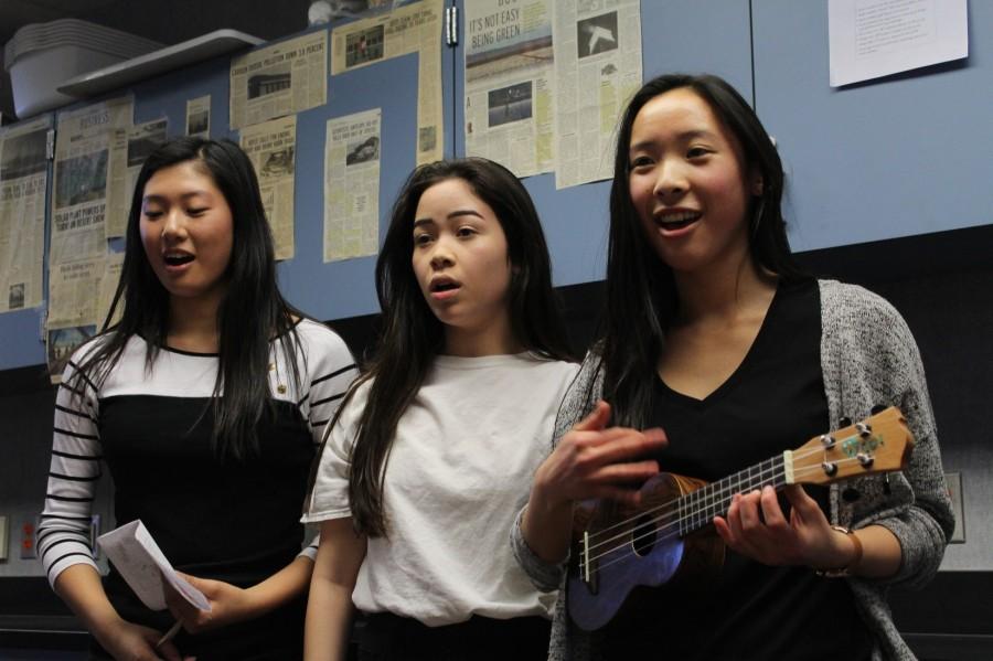 Choir members junior Jodie Lu and sophomores Myra Mayr and Kaitlyn Lee (left to right) sing “Can’t Help Falling in Love” by Elvis Presley as a Valentine’s Day singing gram on Feb. 16.