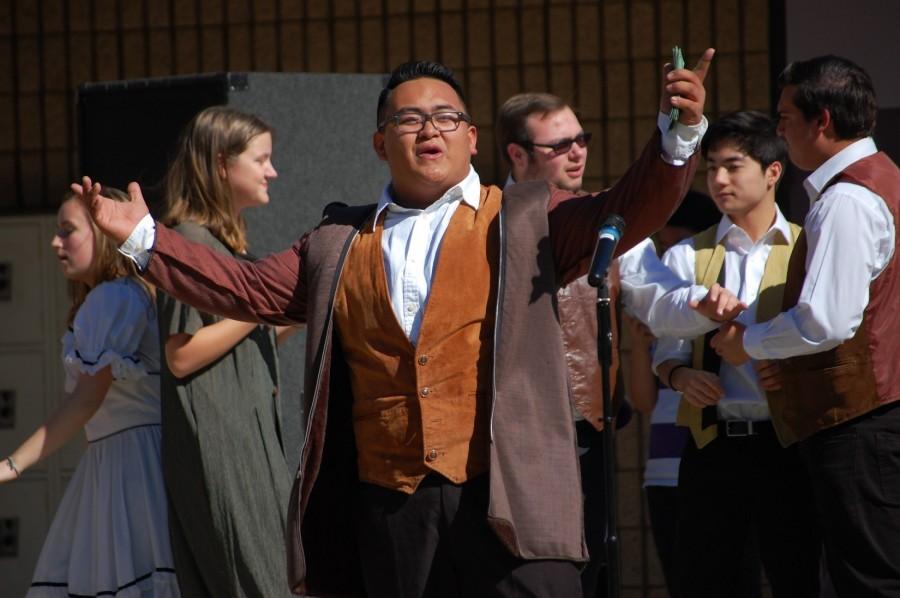 Senior Jordan Osmena promotes the spring musical, “Les Misérables,” during lunch for Performing Arts Week on Feb. 9.
