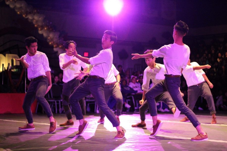 The Diamond Bar All Male Dance Team performs its dance routine at the performing arts rally in the gym on Feb. 17.
