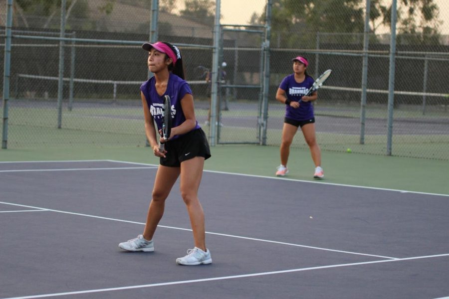Singles players junior Ellie Delano and senior Angeline Cheng paired up.