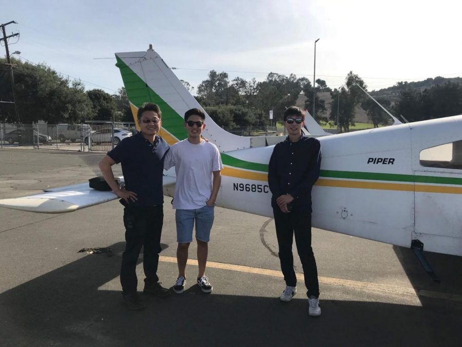 Taking after his pilot father (left) Toby Kim takes to the sky often.