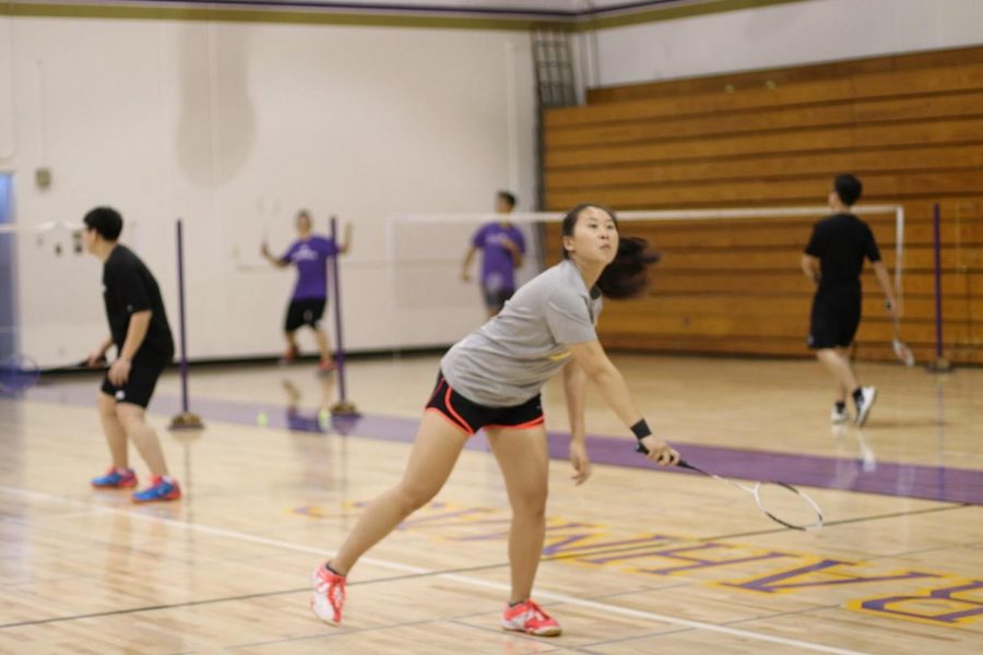 Senior co-captain Vanessa Do volleys the birdie back in a practice match.