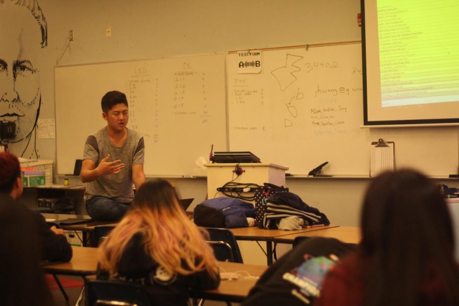Robotics senior co-captain Kenneth Song assigns jobs during a club meeting to prepare for the First Robotics Competition Orange County Regional on Feb. 27.