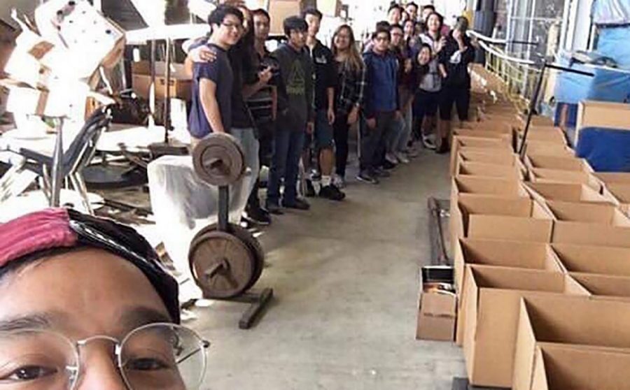 Photo courtesy of JUSTIN PANLILIO

Walnut High School Key Club advisor Justin Panlilio, along with WHS and DBHS Key Club members, prepare to pack cardboard boxes with donations.

