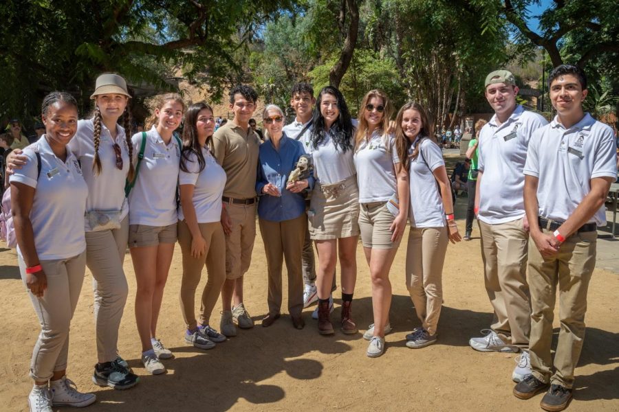 Lopez (far right) takes a picture with Goodall and other volunteers at the LA Zoo.