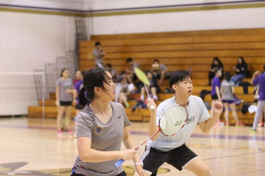 Sophomore Claire Wang, left, and senior Daniel Huang play in a doubles match during the Pasedena win.