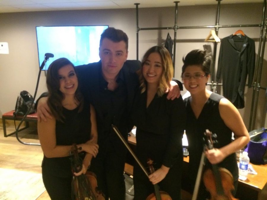Alumna Joy Yi, third from left, has performed with multiple stars such as Sam Smith and Bastille, and also on The Ellen DeGeneres Show.