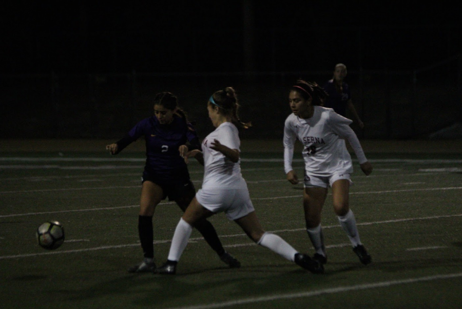 Sophomore Isabelle Hurtado attempts to dribble through defensive backs in a 3-1 loss against La Serna High School.