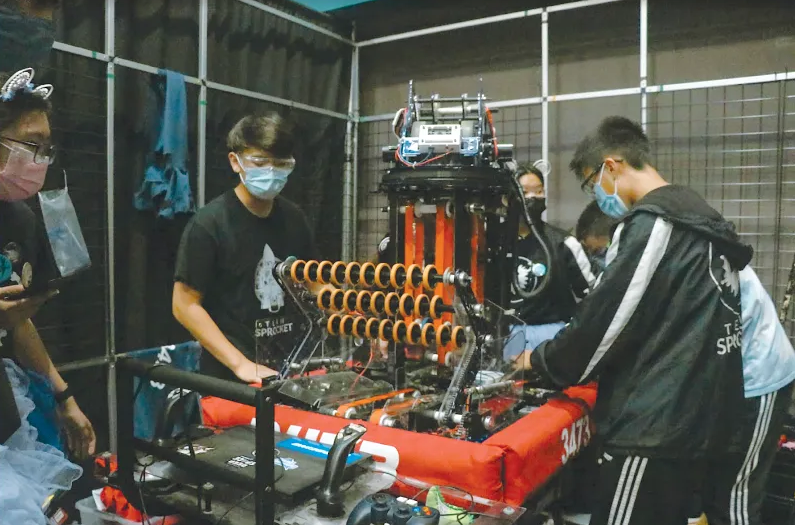 Members scrambled to address issues with the robot, built nearly two years ago in 2020, in order to prepare it for action.