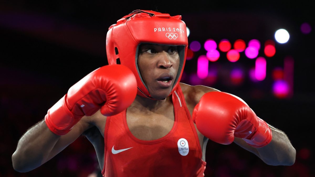 PARIS, FRANCE - AUGUST 08: Cindy Winner Djankeu Ngamba of Refugee Olympic Team looks on against Atheyna Bibeichi Bylon of Team Panama during the Boxing Women's 75kg Semifinal match on day thirteen of the Olympic Games Paris 2024 at Roland Garros on August 08, 2024 in Paris, France. (Photo by Richard Pelham/Getty Images)